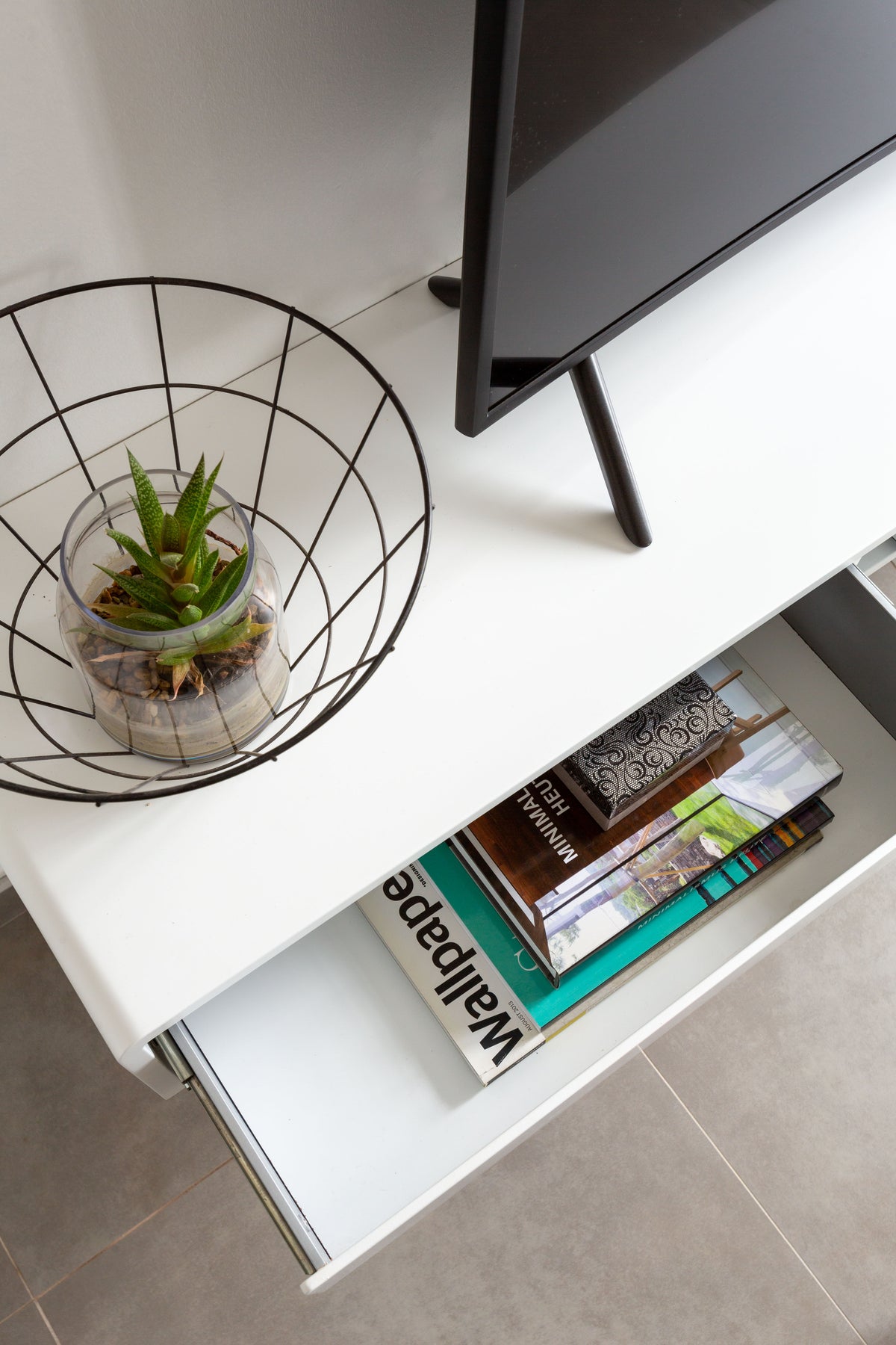 Floating TV unit with open drawer